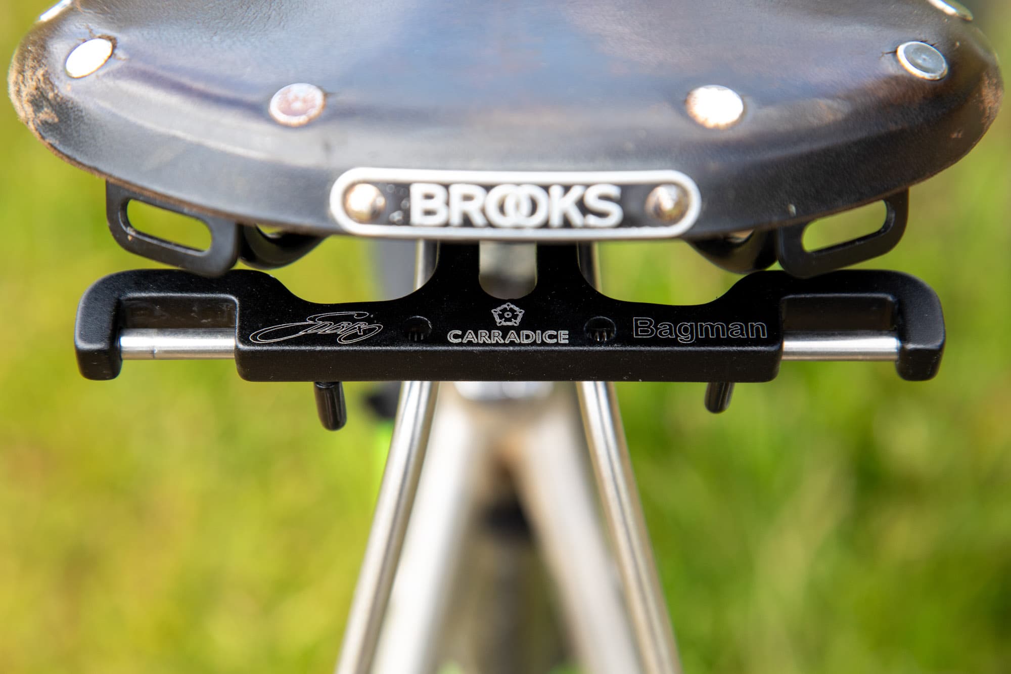 The Carradice Bagman quick release block mounted under a Brooks saddle.