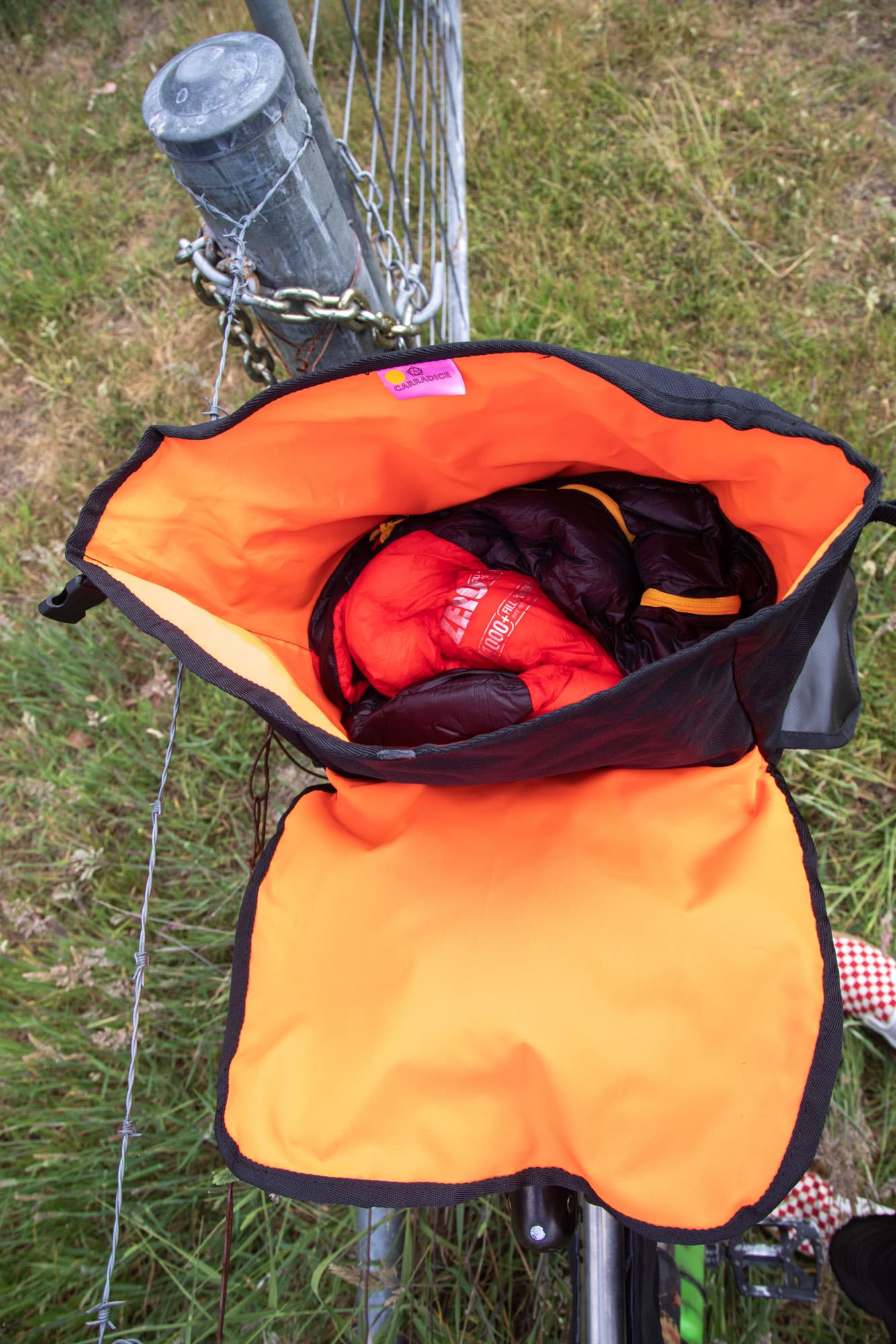 Looking down into the Odyssey's bright orange interior packed with gear.