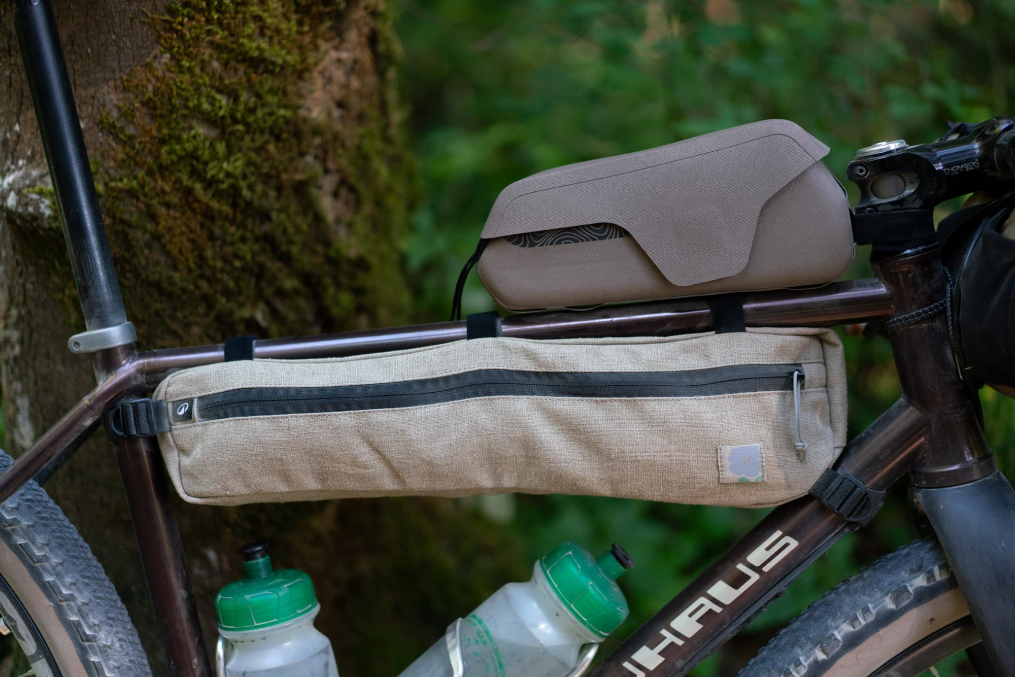 Natural tan linen against the root-beer frame.