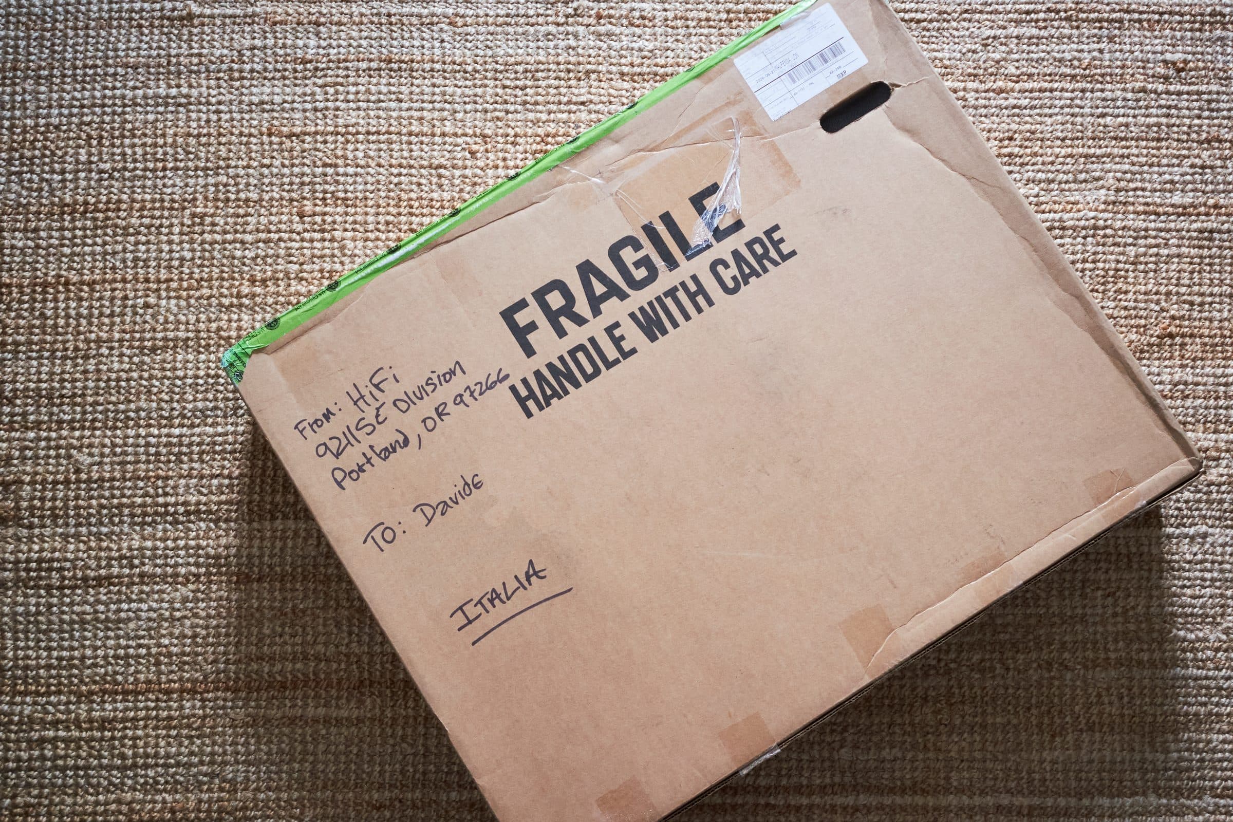 The HiFi box marked Fragile, Handle With Care, addressed to Davide in Italy.