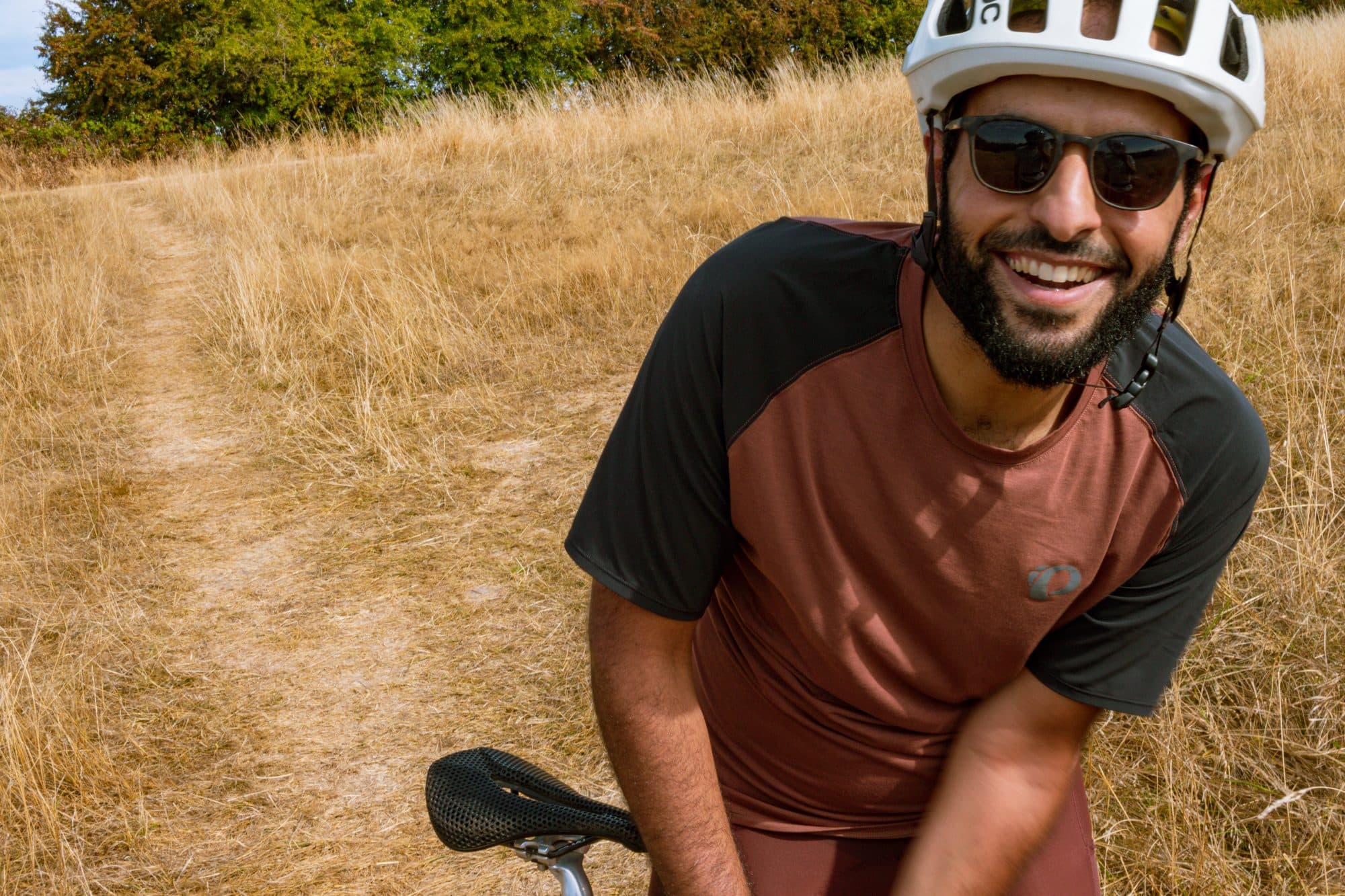 Abe grinning in the Pearl Izumi Expedition jersey between laps.