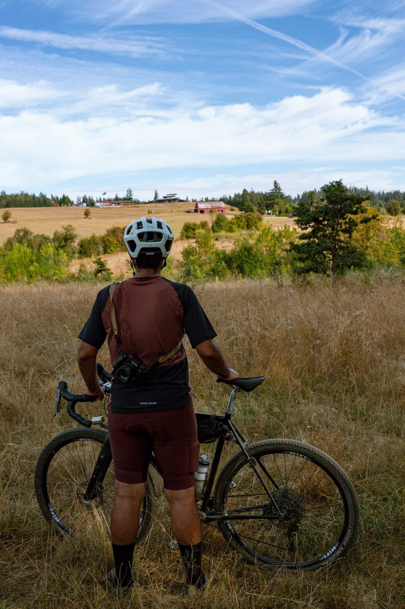 Abe standing with the bike in the Expedition kit.