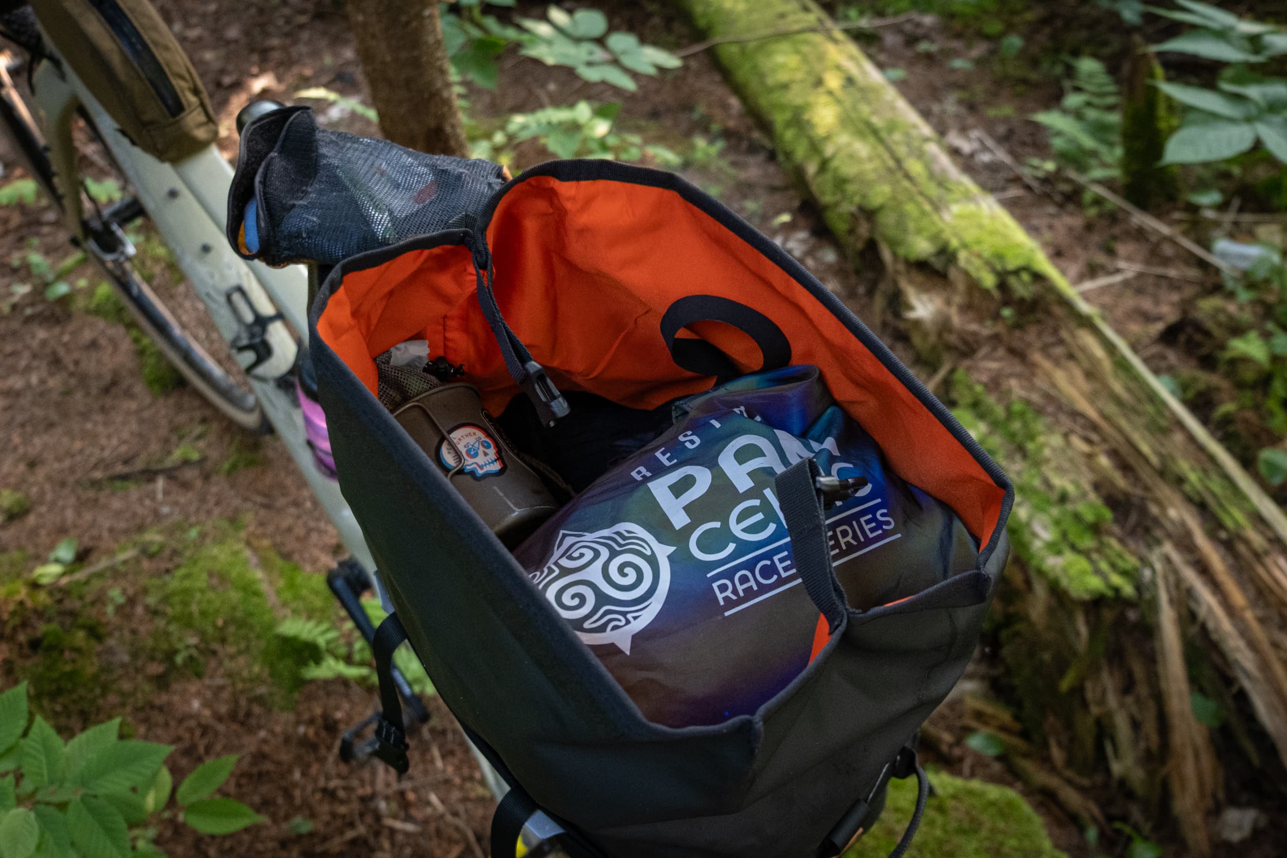 Switch Top Bag packed with a Pan Celtic Race Series buff and gear.