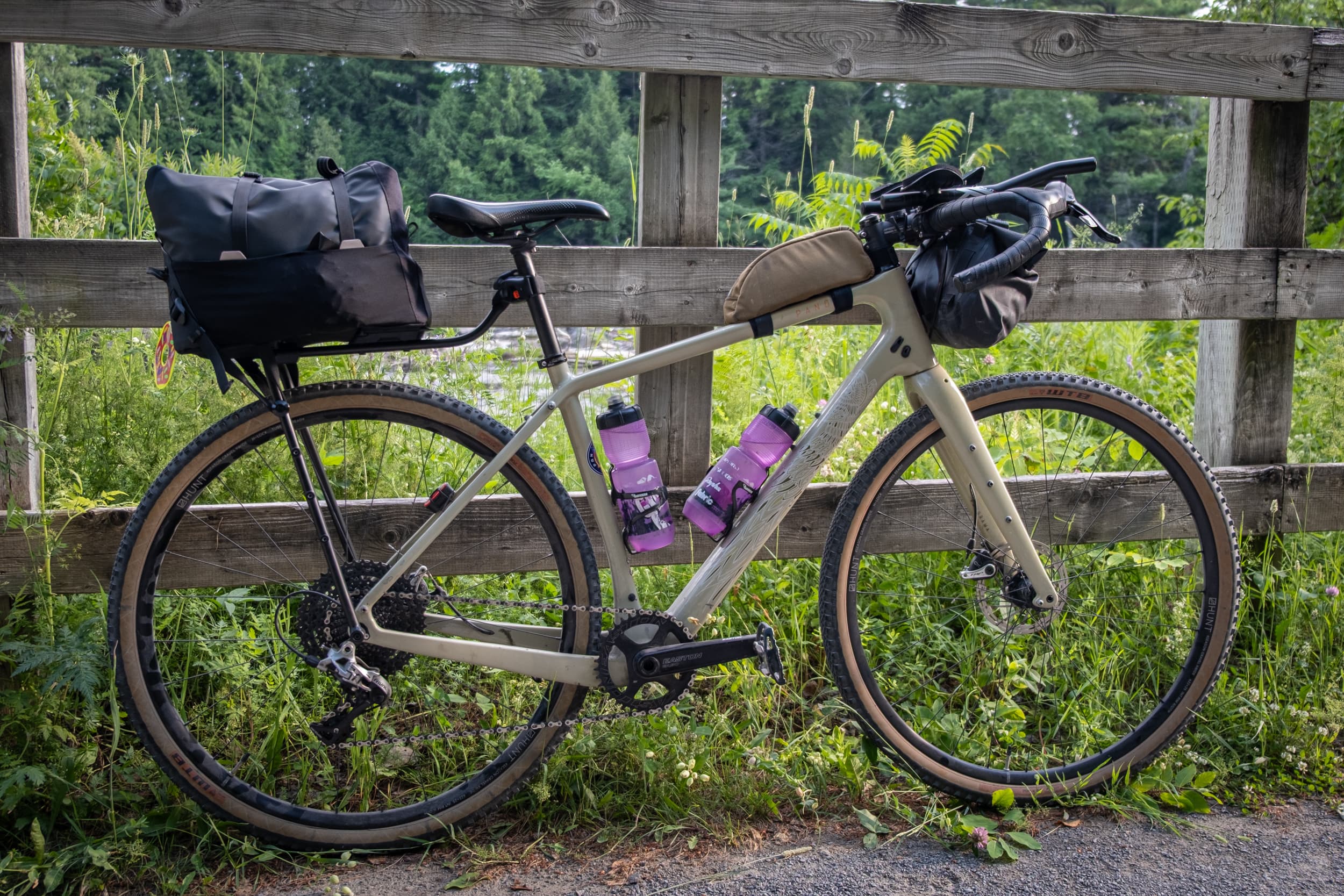 Switch Top Bag mounted on the rack against the same wood fence.