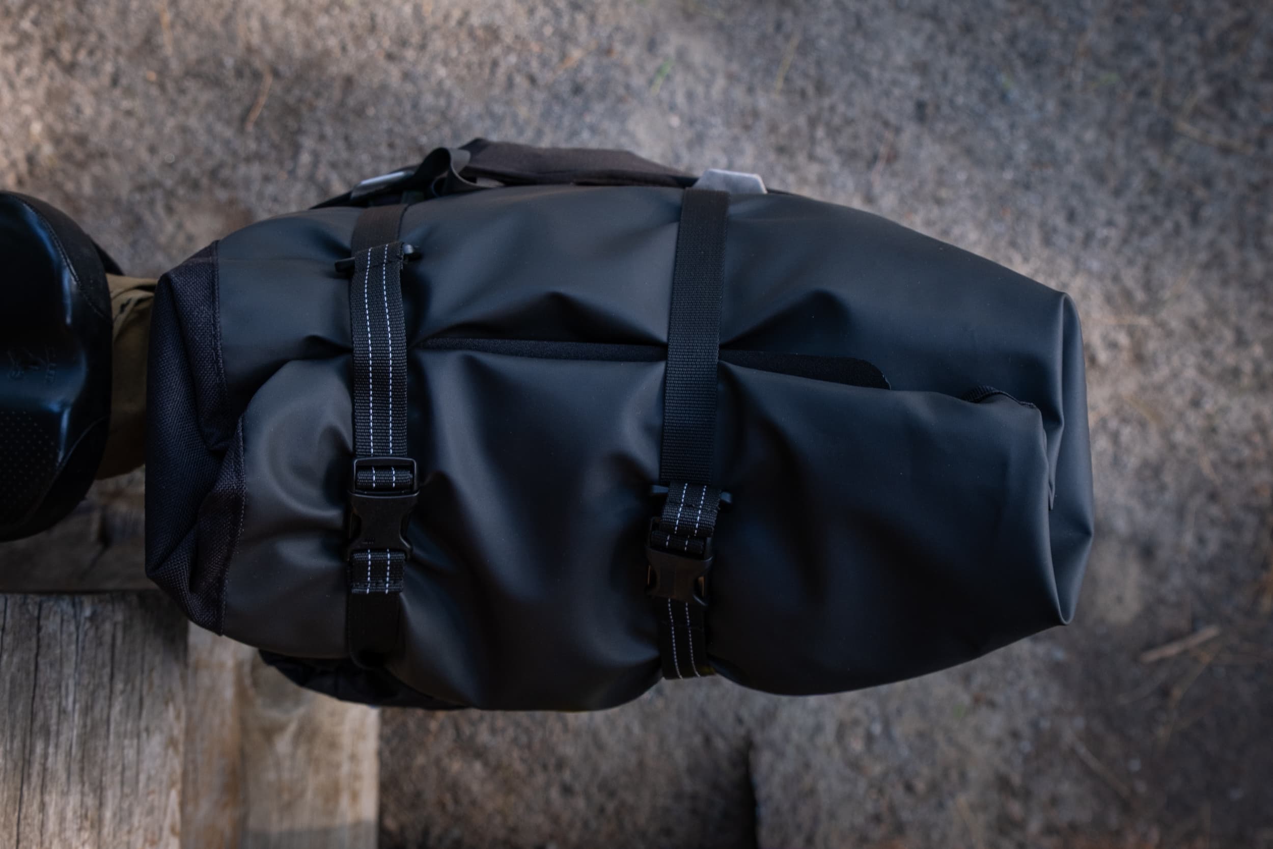 The Switch Top Bag rolled up and strapped down.