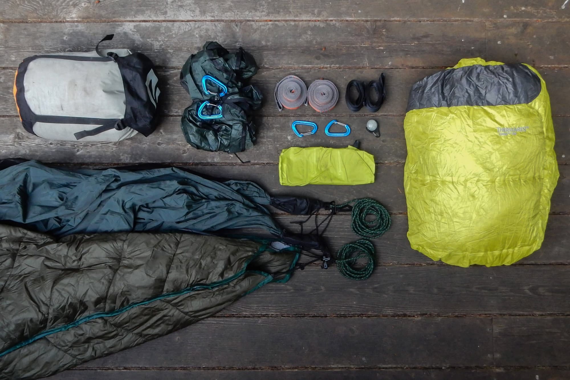 Rainfly shelter setup over hammock
