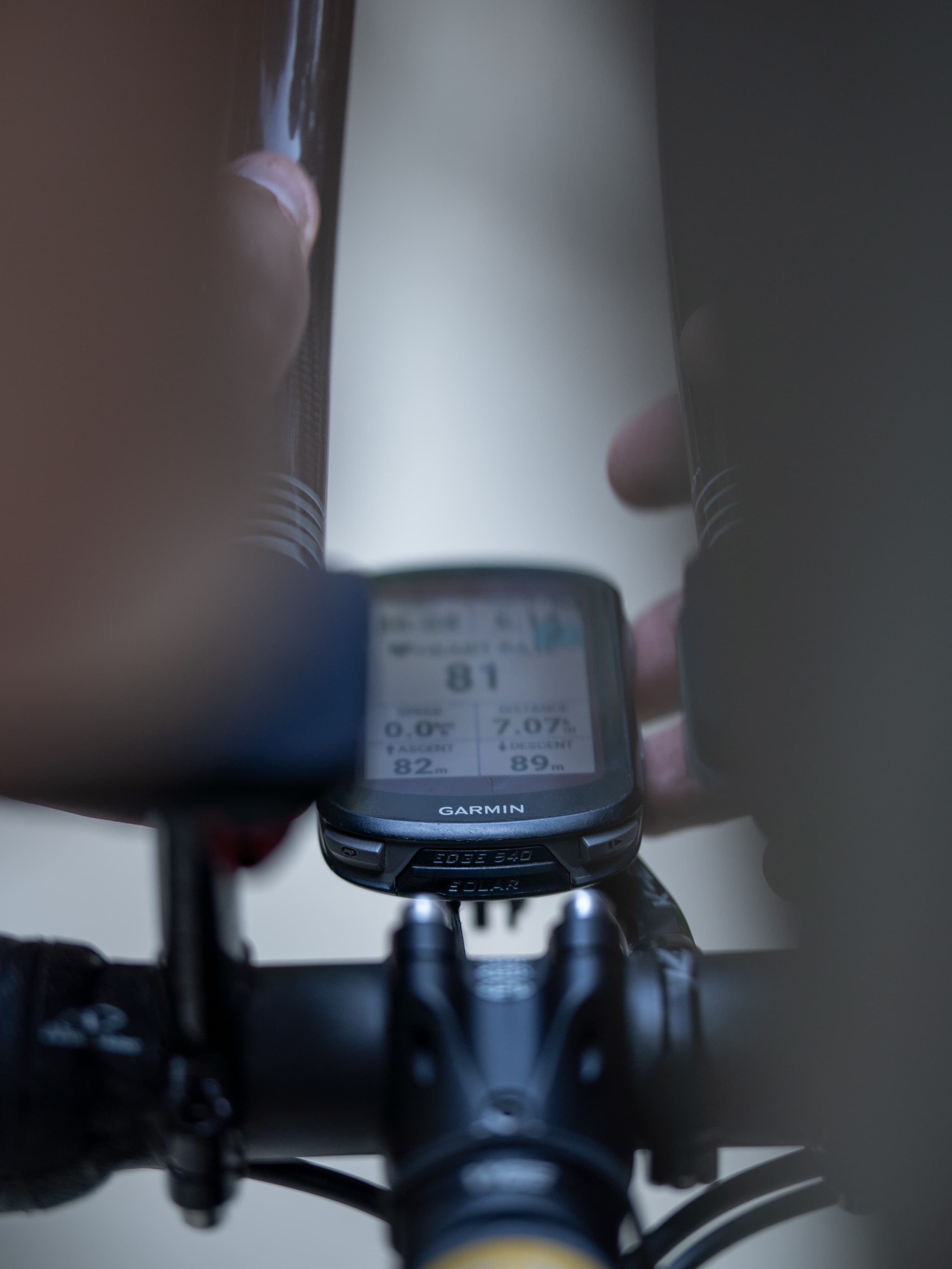 The Garmin, readable between the two extensions.