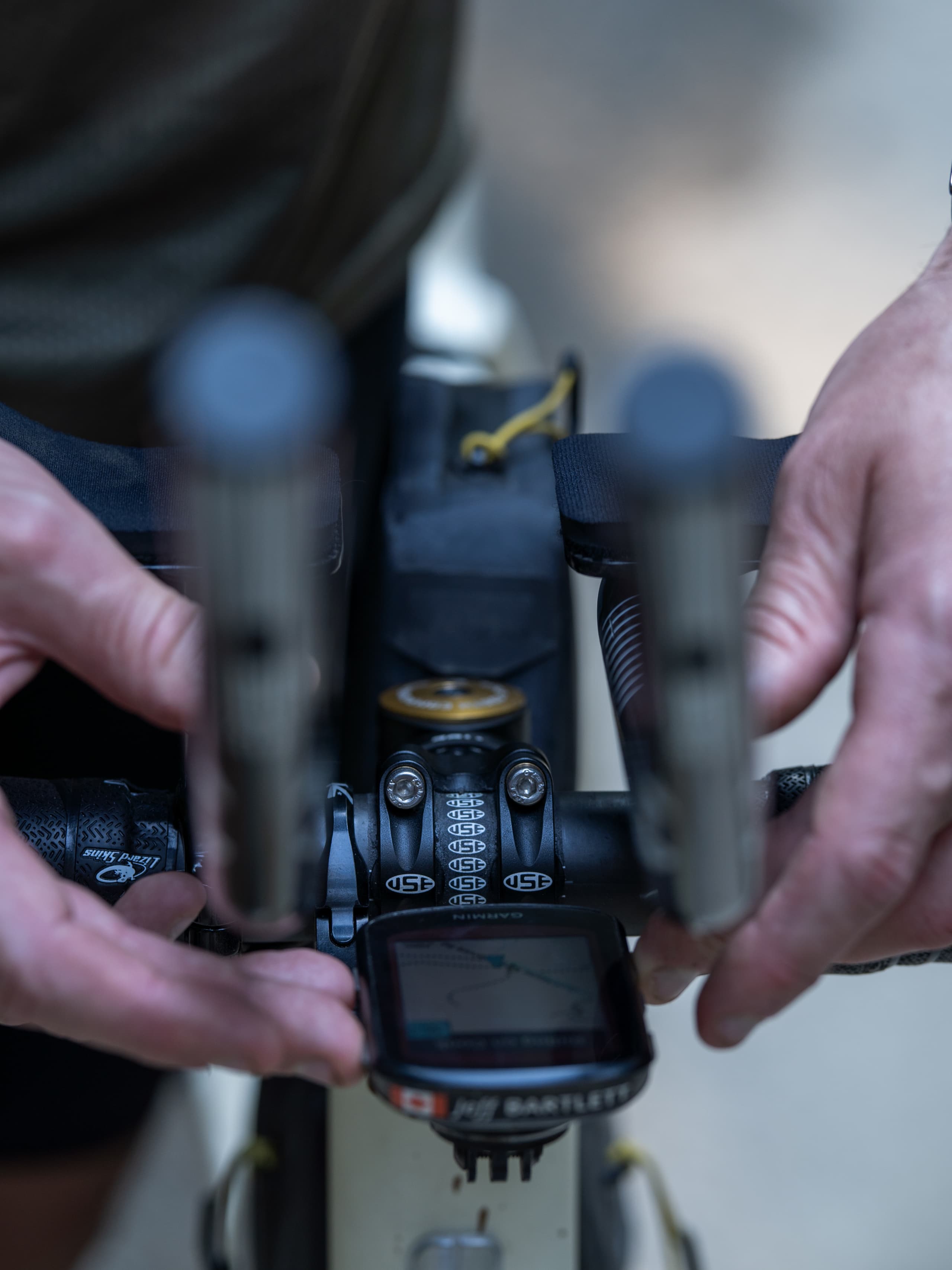 Adjusting the Garmin mount on the frame.