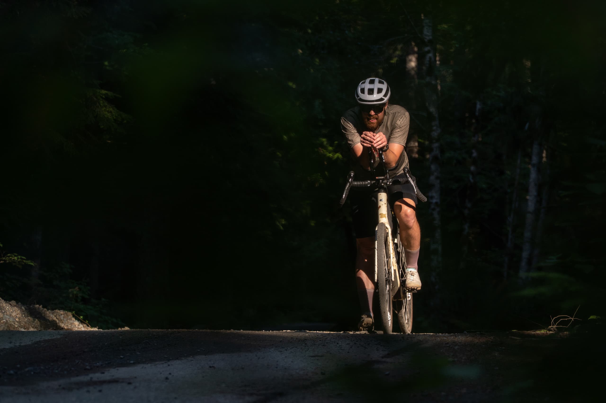 Jeff riding into shadow on the gravel loop.