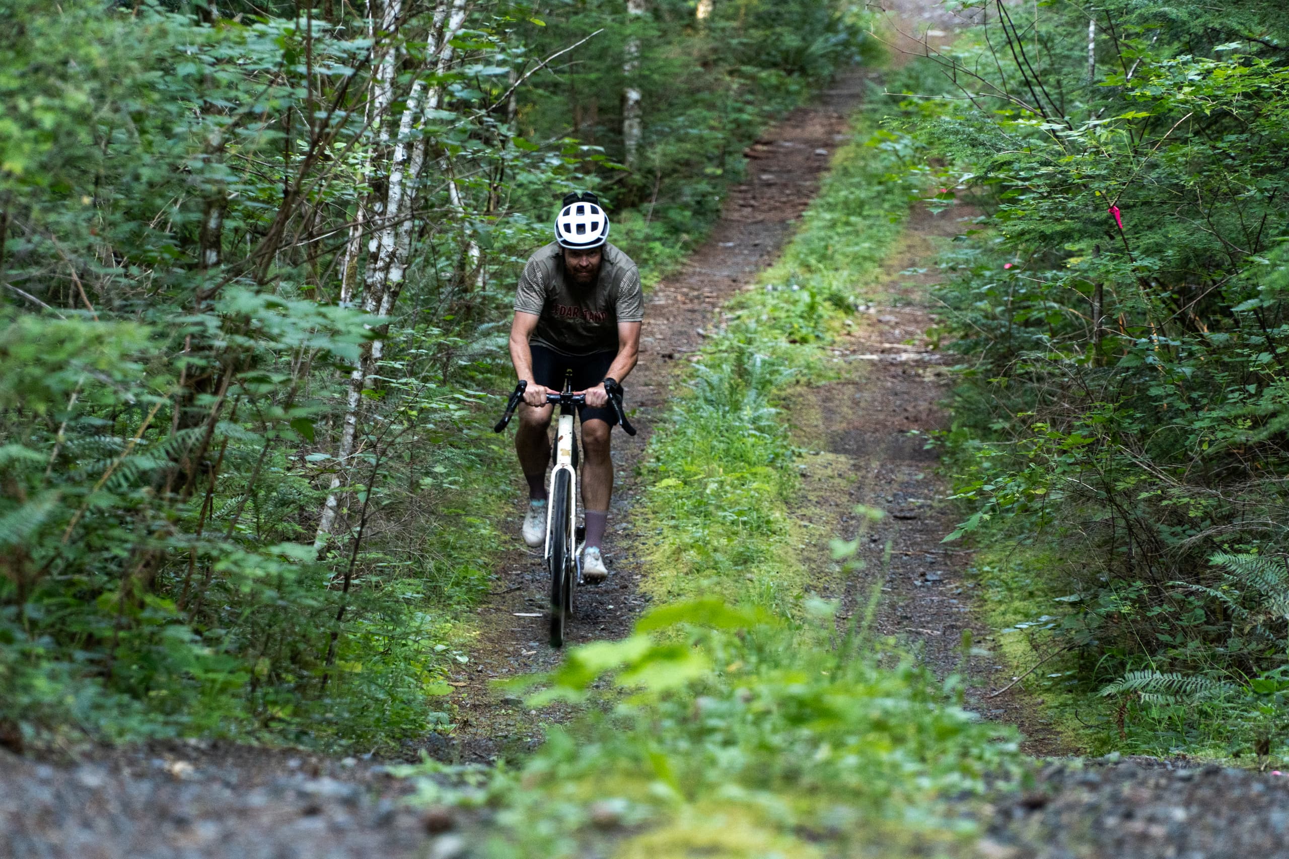 Riding a forested doubletrack section of the loop.