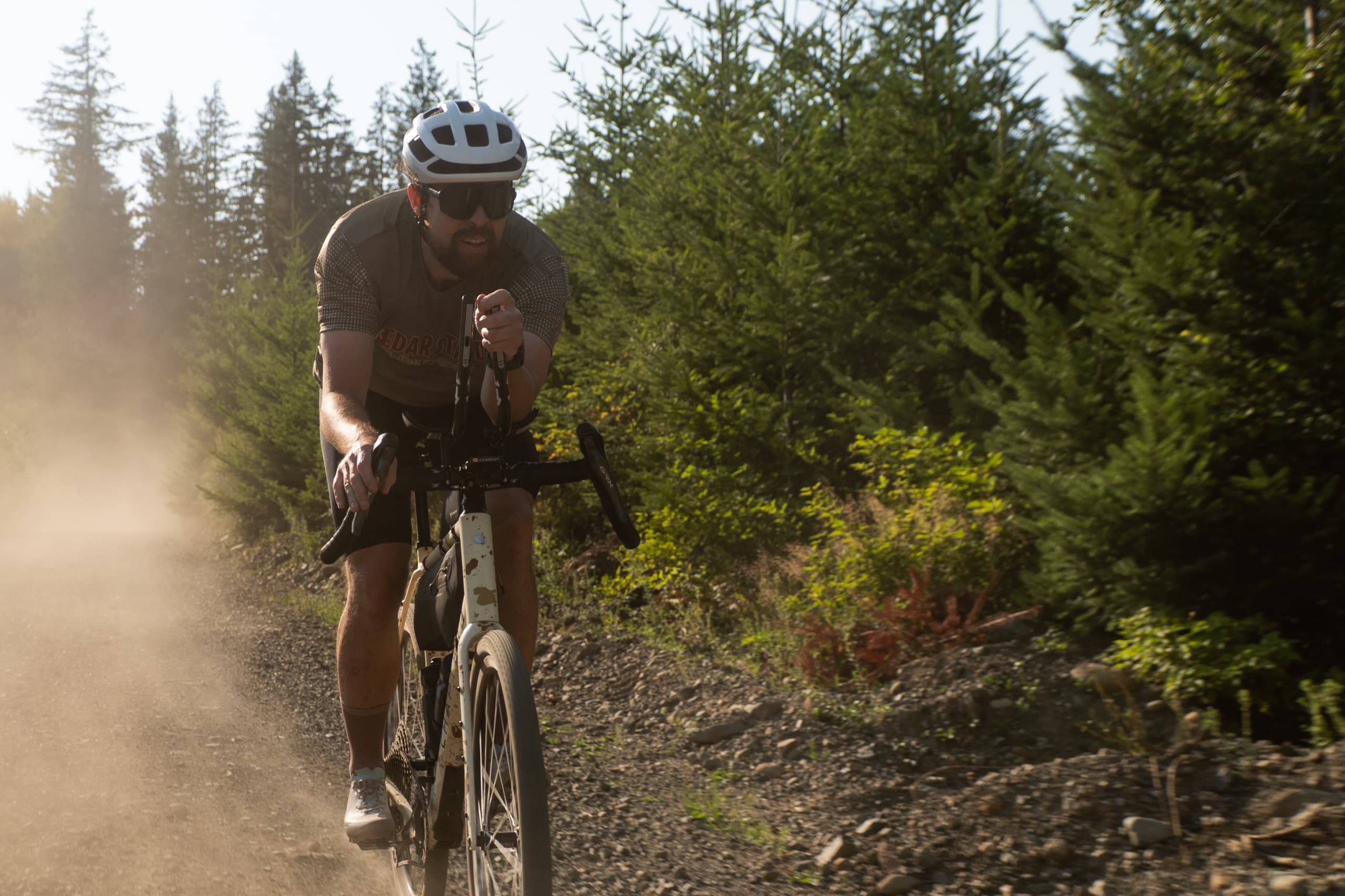 Kicking up dust on a dry gravel stretch.