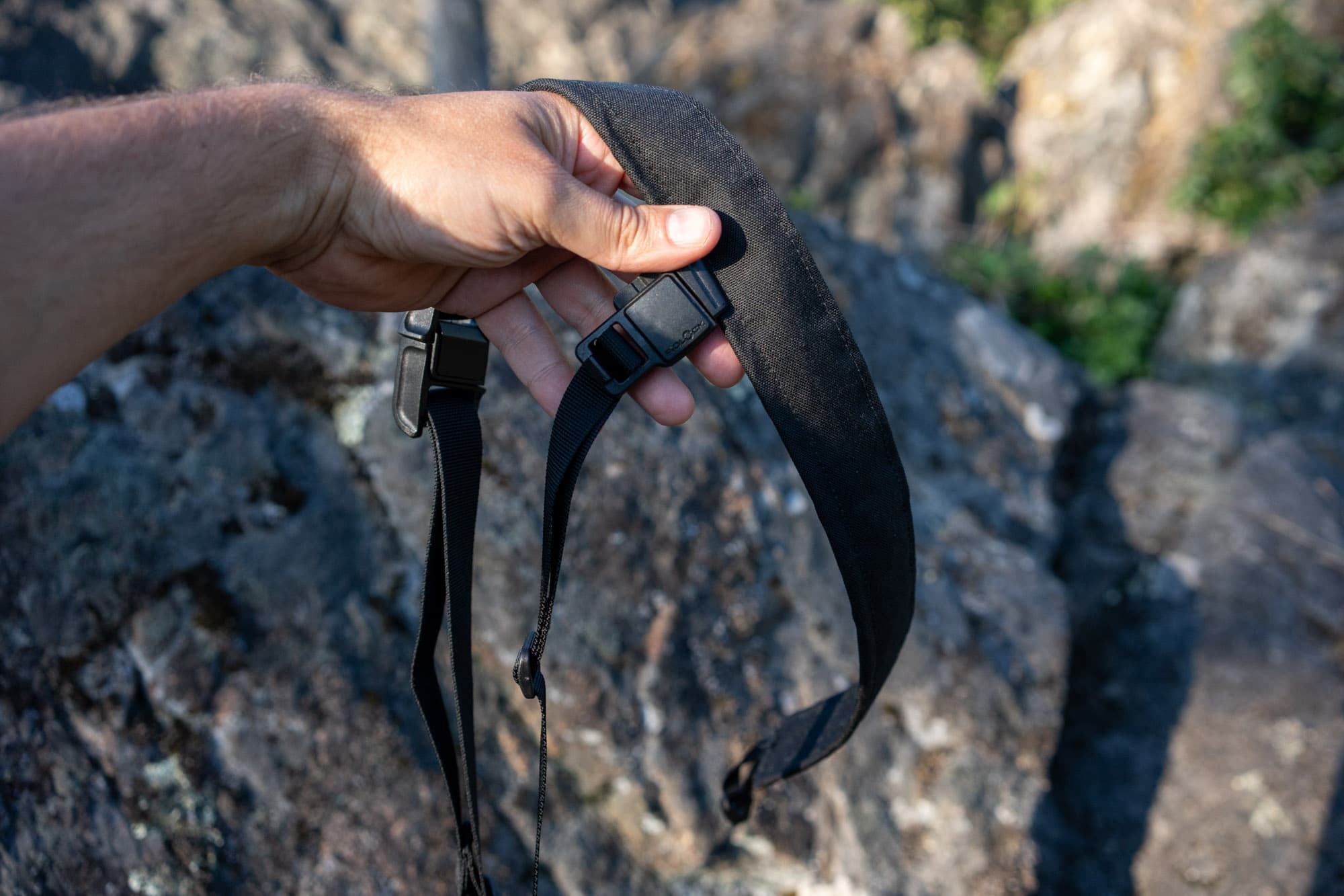A 3-point camera strap for cycling.