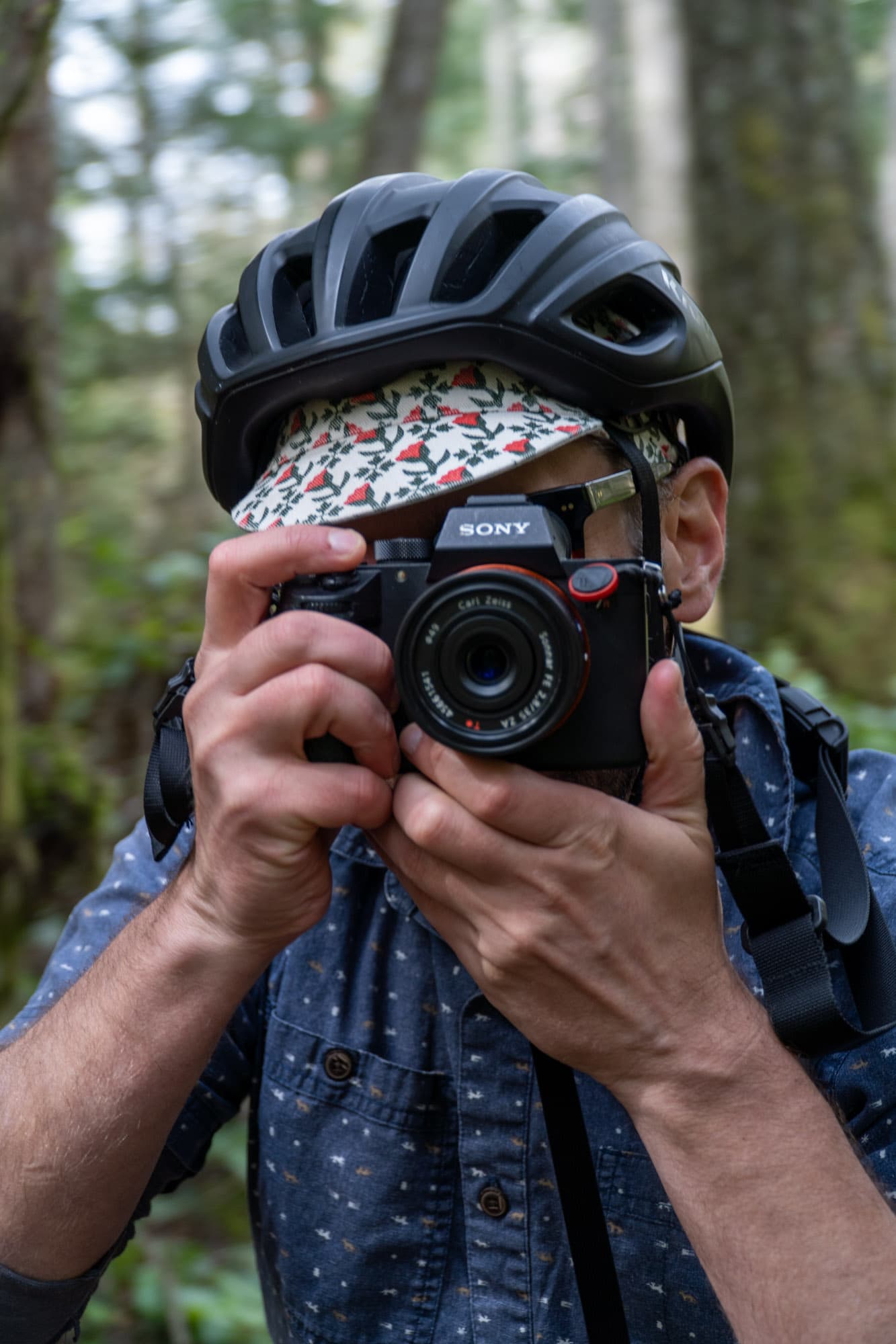 BAry takes a photo.