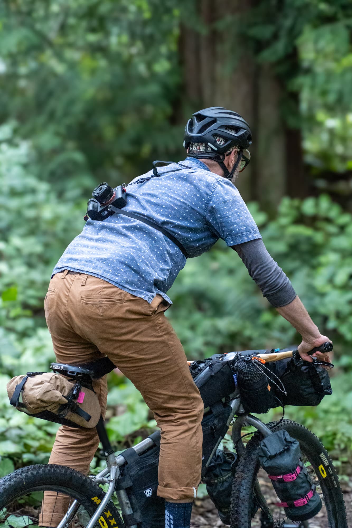 Cycling with a 3-point harness.