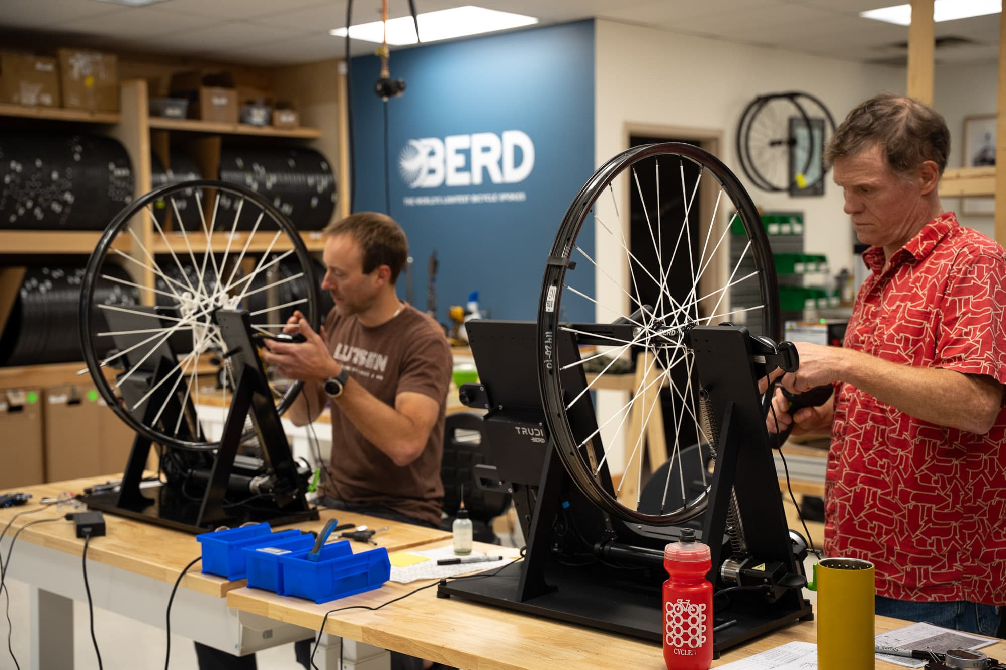The Berd team building the wheels.