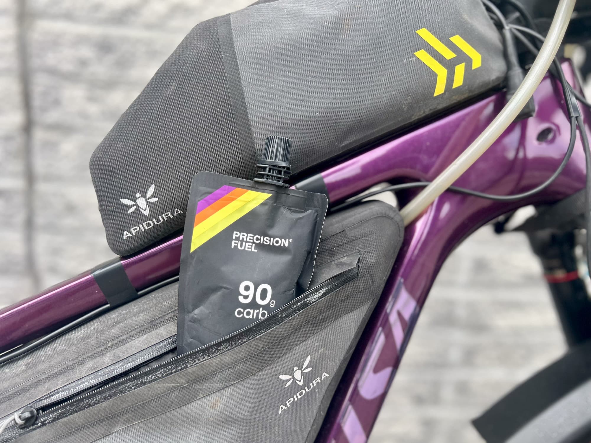 Apidura frame bag detail with a Precision Fuel gel.