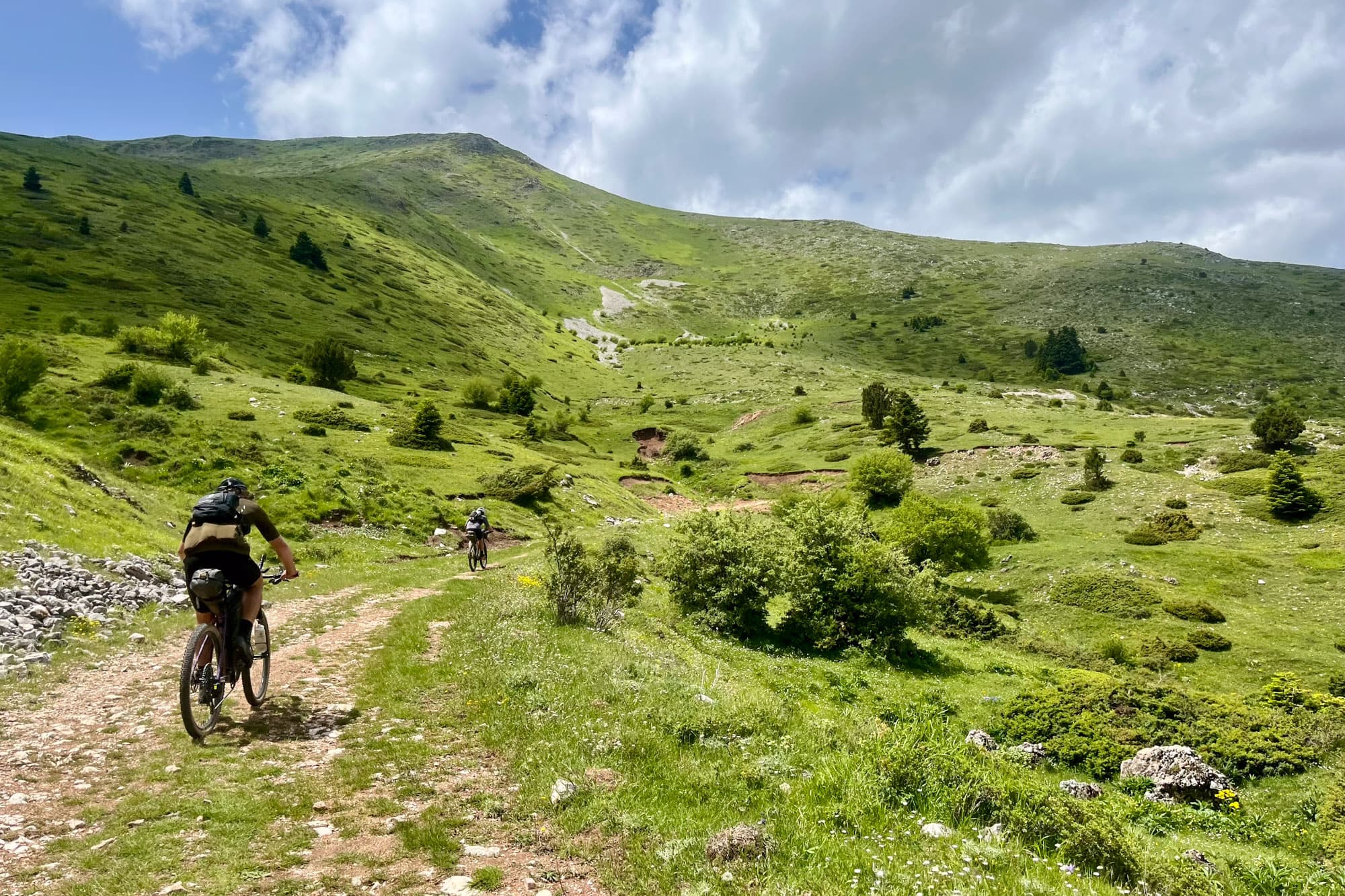 The racers charge the mountains.