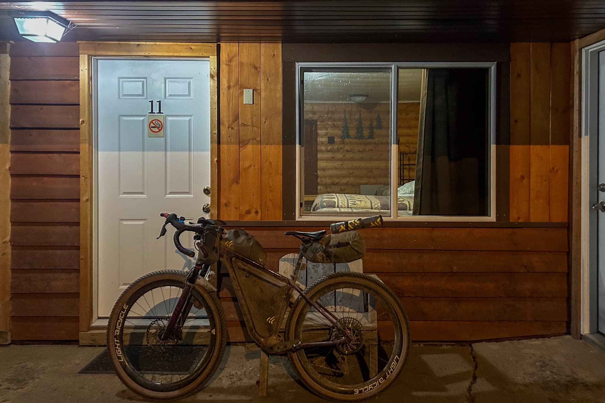 Dolly parked outside room 11 at a motel stop