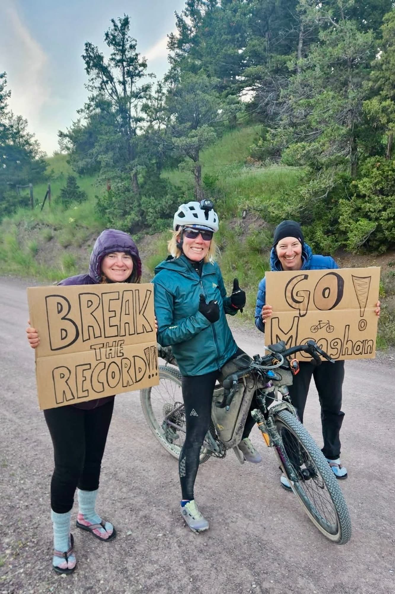 Dotwatchers greet Meaghan with hand-drawn signs urging her to break the record