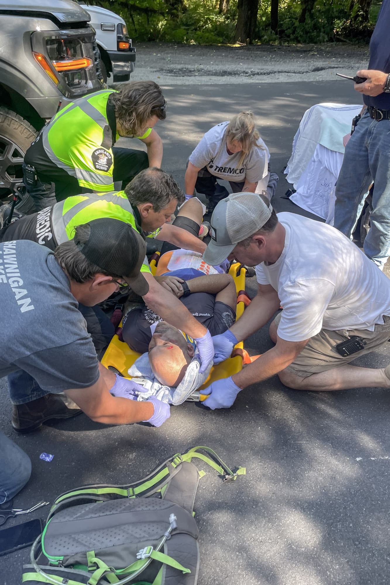 Keith being treated by paramedics.