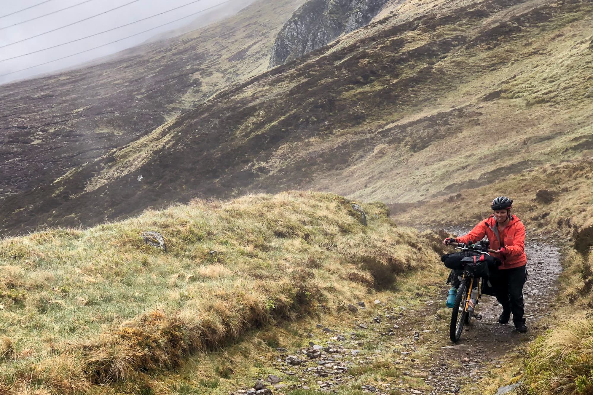 Tara taking her bike for a hike again.